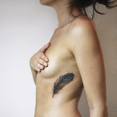 Тату на ребрах для девушек