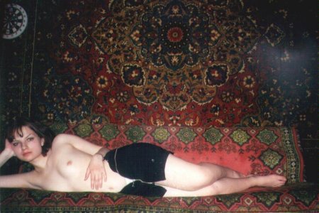 На фоне ковра