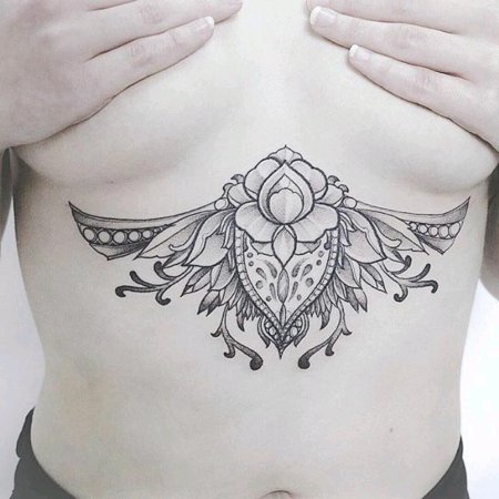 Женские тату под грудью
