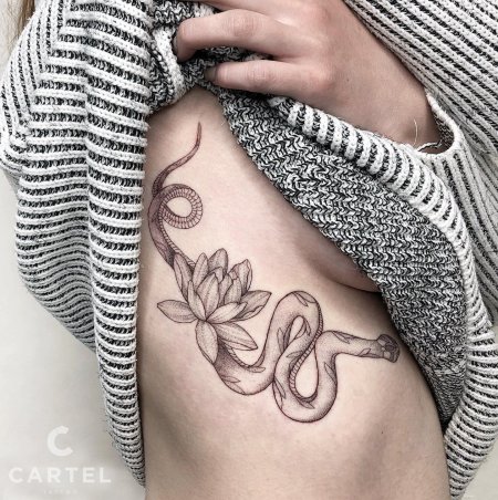 Тату змея значение для девушек