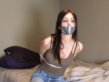 Связанные скотчем девушки